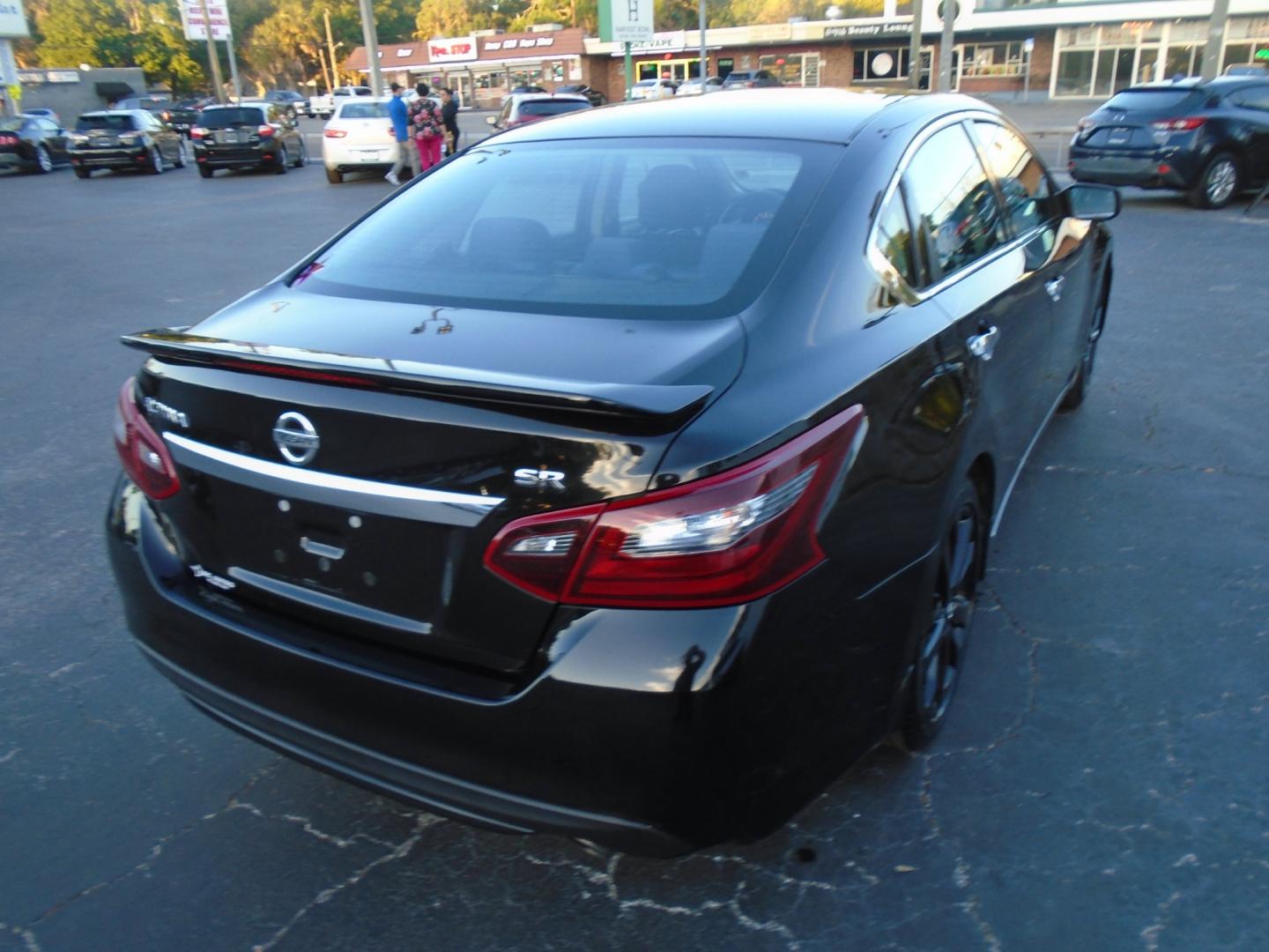 2017 Nissan Altima (1N4AL3AP5HC) , located at 6112 N Florida Avenue, Tampa, FL, 33604, (888) 521-5131, 27.954929, -82.459534 - Photo#4